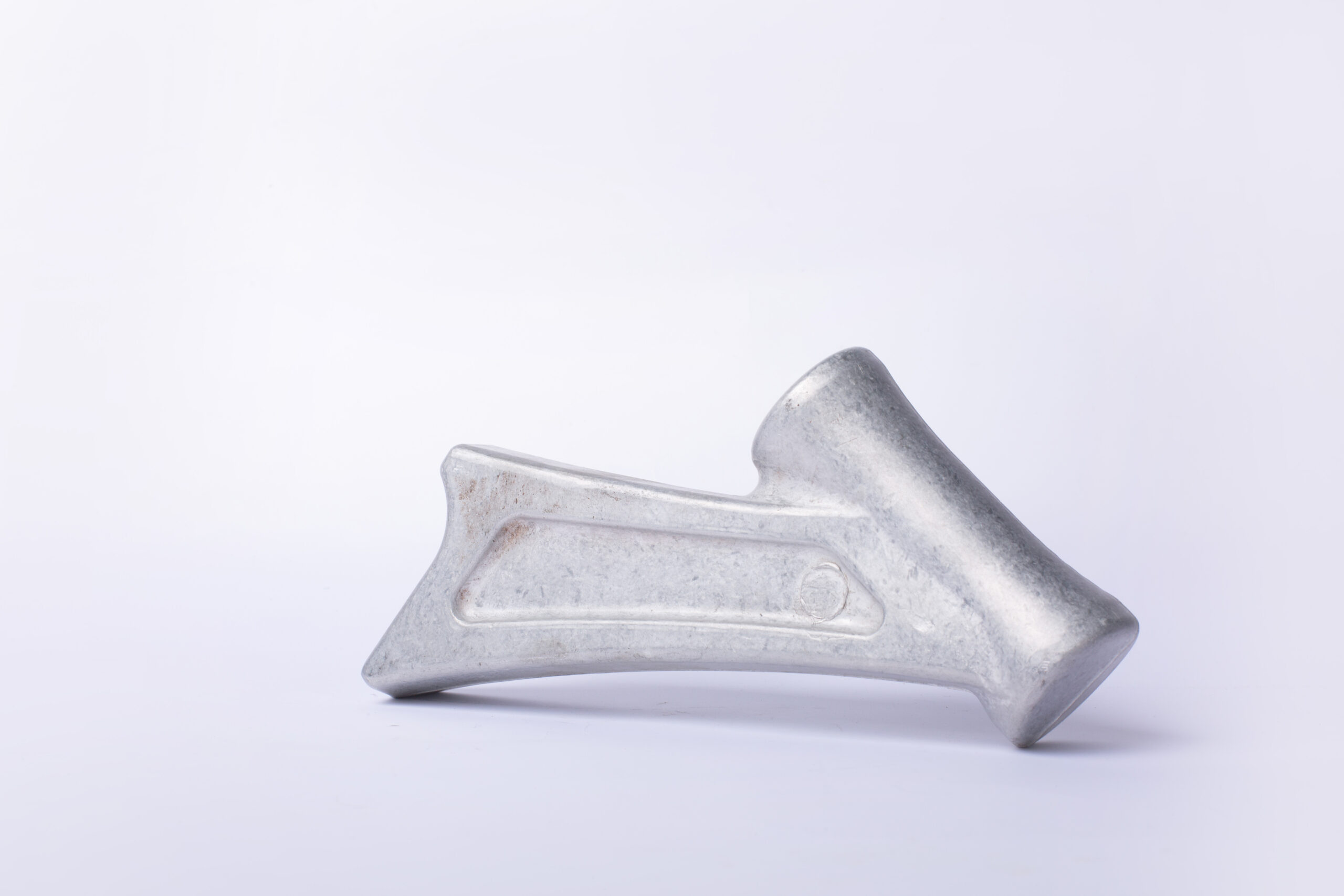 What are the factors that determine the strength of an extruded product?