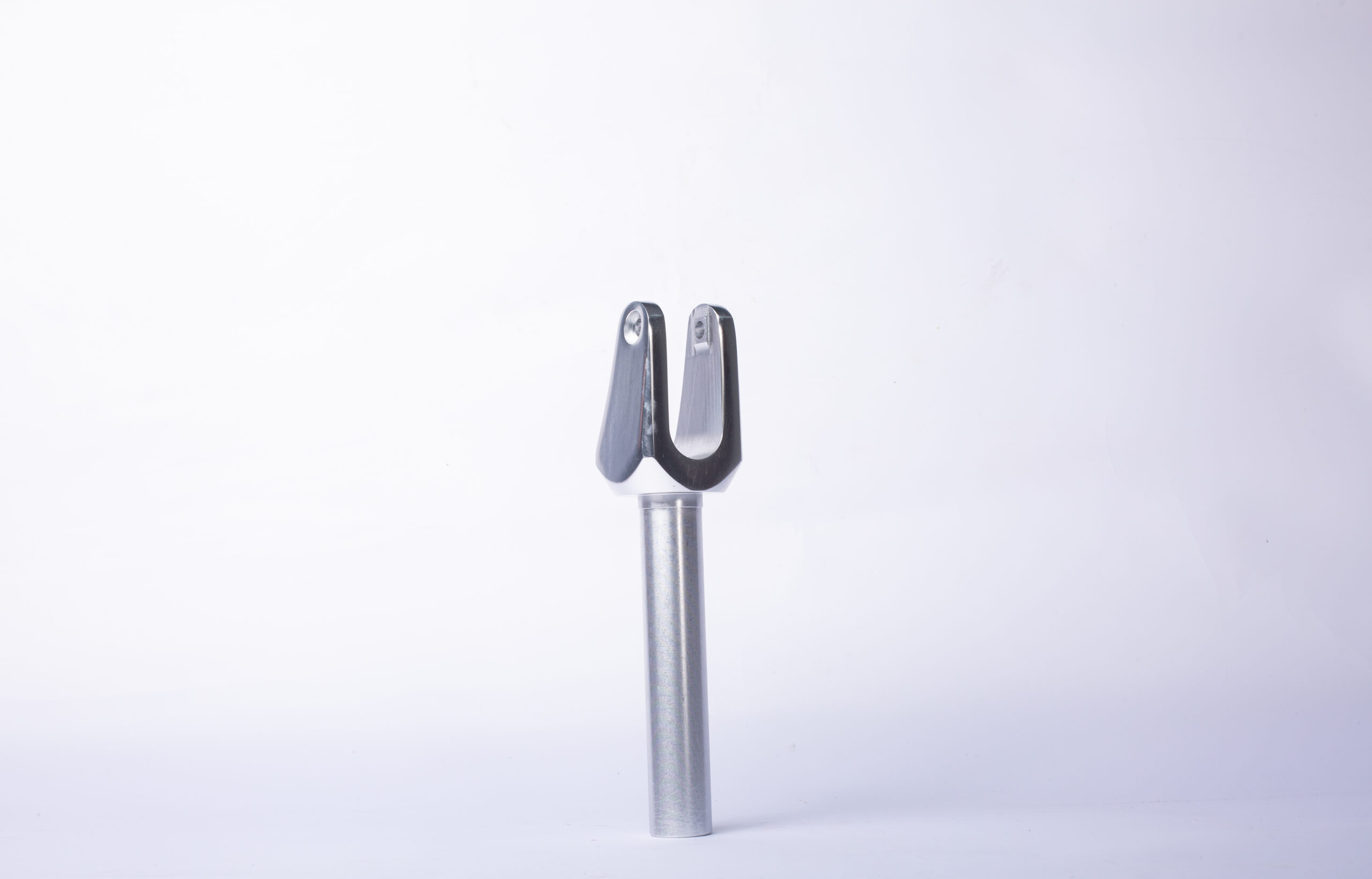 How does the cooling process affect the properties of the extruded product?