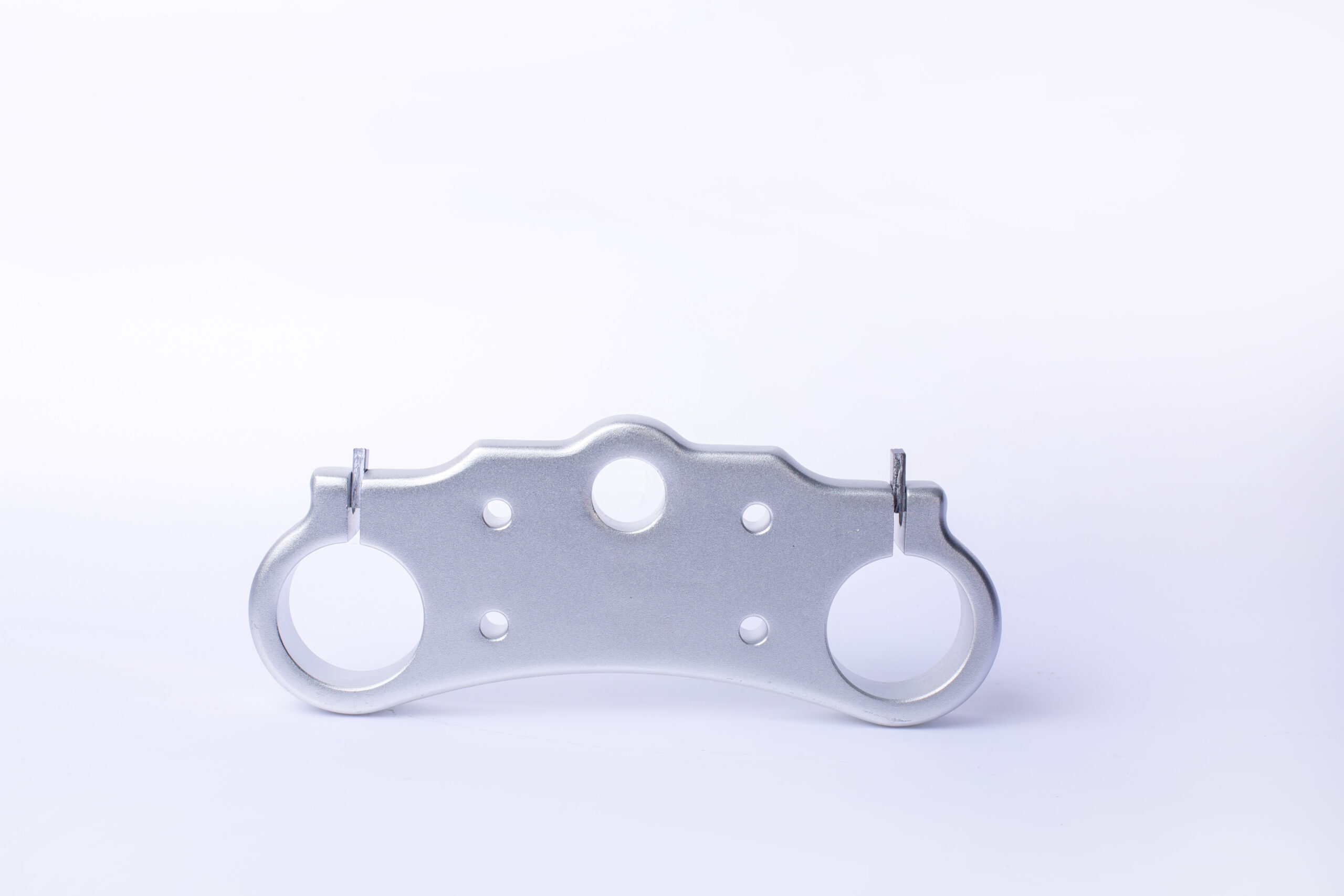 How does the cooling process affect the properties of the extruded product?